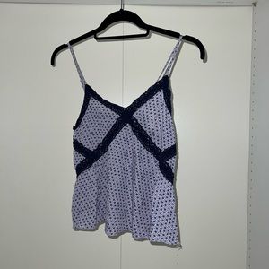 Super comfy Aerie top. fits a smaller chest best. small tear but an easy fix